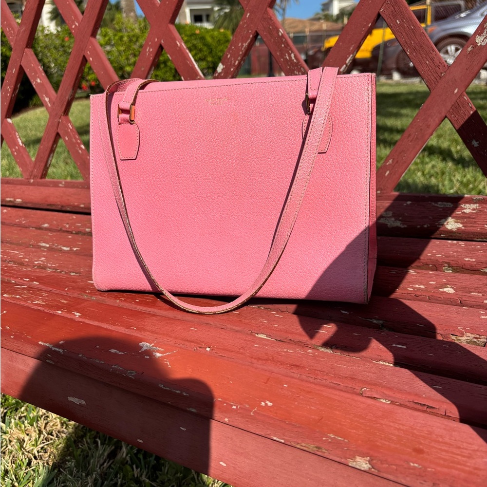 Kate Spade Iconic Sam shoulder bag in pink pebbled leather.